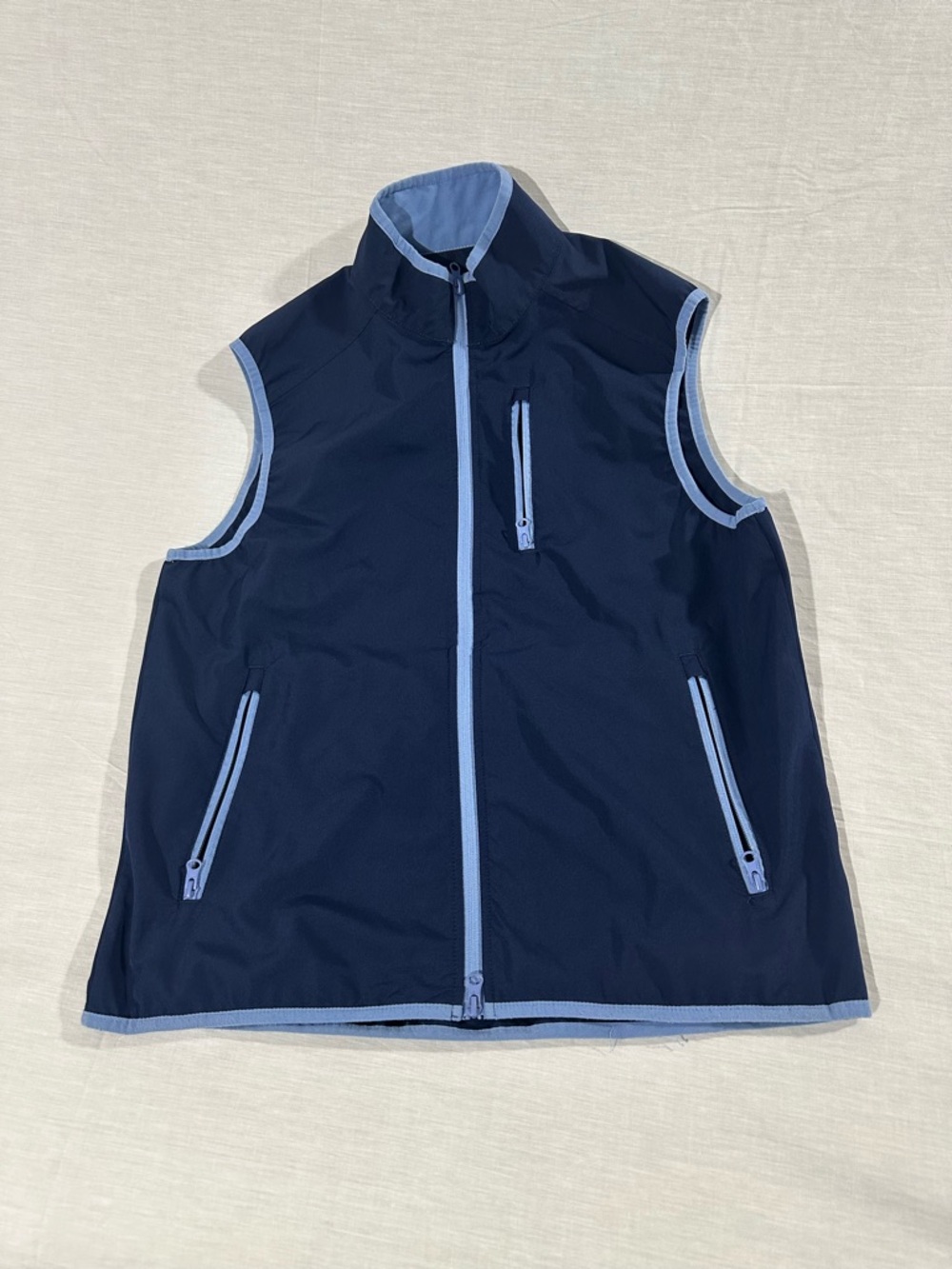 Tailorbyrd Navy Blue Sleeveless Zip Rain Vest with Light Blue Trim